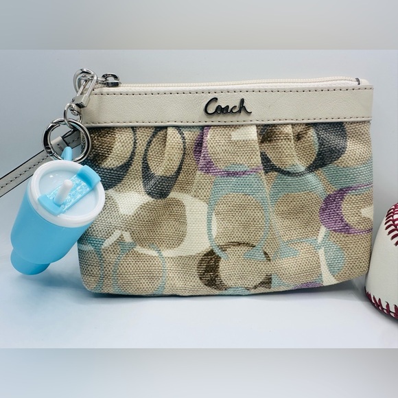 Coach Handbags - Coach Canvas Wristlet with Tumbler Bag Charm